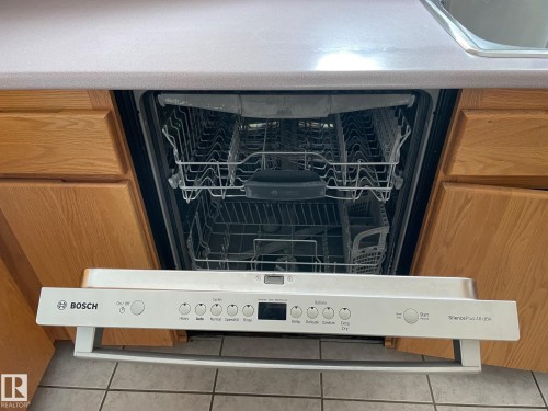 Integrated dishwasher with a white control panel - 44 Arlington Drive, St. Albert, AB -  Photo Showing Other Room
