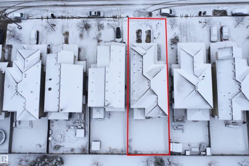 Aerial view of the property, featuring a pitched roof and a spacious backyard - 469 Ainslie Crescent Sw, Edmonton, AB - Other