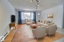 Virtually Staged - 5109 49 Avenue, Andrew, AB  - Indoor Photo Showing Living Room 