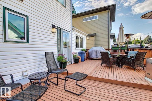 Expansive wooden deck with space for outdoor seating and dining - 11126 52 Street, Edmonton, AB - Outdoor With Deck Patio Veranda With Exterior