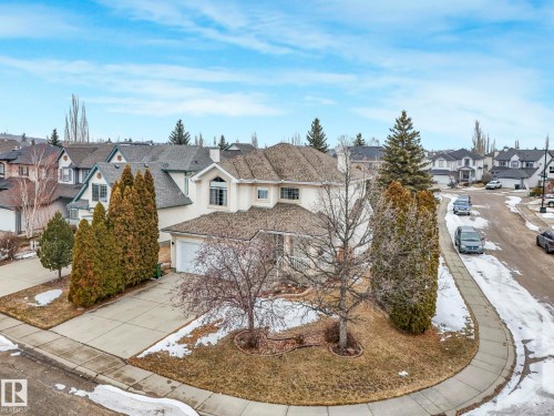 The property features a private driveway and an attached garage - 11704 11 Avenue, Edmonton, AB - Outdoor