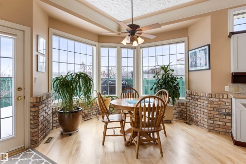 4 Placer Close, St. Albert, AB - Indoor Photo Showing Dining Room With Fireplace