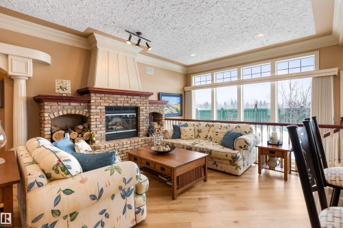 4 Placer Close, St. Albert, AB - Indoor Photo Showing Living Room With Fireplace