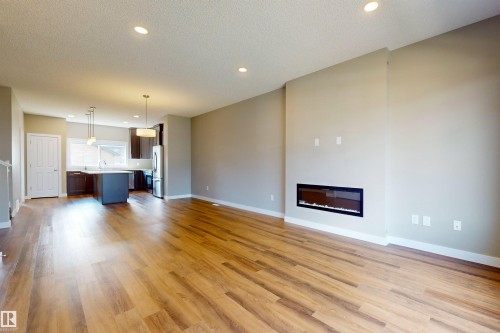3704 2 Street, Edmonton, AB - Indoor Photo Showing Living Room With Fireplace