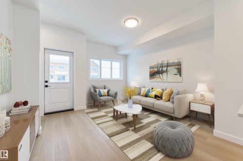 49 18120 28 Ave, Edmonton, AB - Indoor Photo Showing Living Room