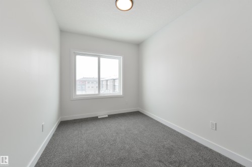 49 18120 28 Ave, Edmonton, AB - Indoor Photo Showing Other Room
