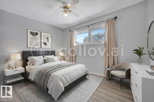 Bedroom featuring light gray walls, wood-finish flooring, a ceiling fan with integrated lighting, and a double window - 12140 53 Street, Edmonton, AB - Indoor Photo Showing Bedroom