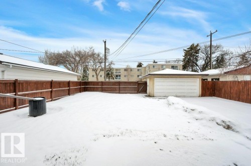 The property features a fenced yard, providing a private outdoor space - 12140 53 Street, Edmonton, AB - Outdoor