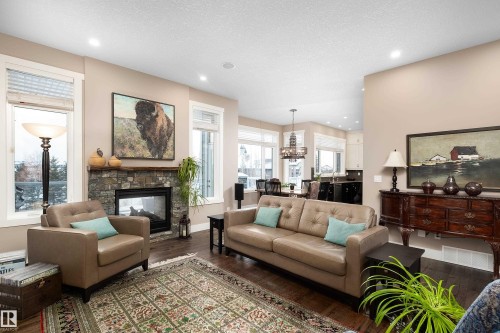 1079 Genesis Lake Boulevard, Stony Plain, AB - Indoor Photo Showing Living Room With Fireplace