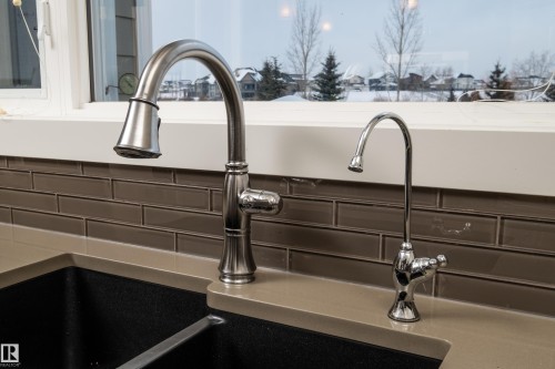 1079 Genesis Lake Boulevard, Stony Plain, AB - Indoor Photo Showing Kitchen With Double Sink