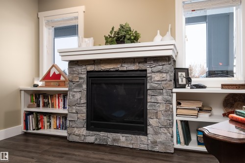 1079 Genesis Lake Boulevard, Stony Plain, AB - Indoor Photo Showing Living Room With Fireplace