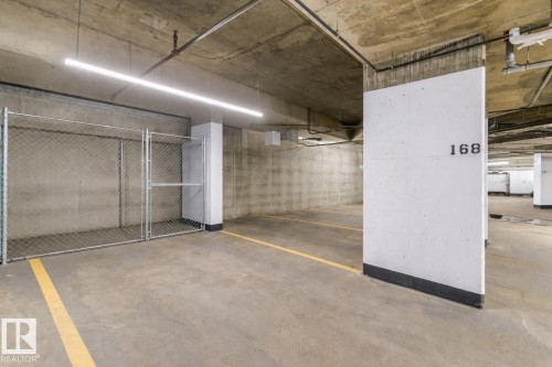 212 11080 Ellerslie Road, Edmonton, AB - Indoor Photo Showing Garage