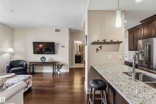 212 11080 Ellerslie Road, Edmonton, AB - Indoor Photo Showing Kitchen With Double Sink With Upgraded Kitchen