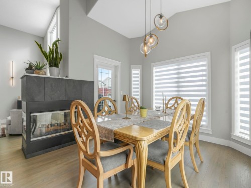 14 Eldon Court, St. Albert, AB - Indoor Photo Showing Dining Room With Fireplace