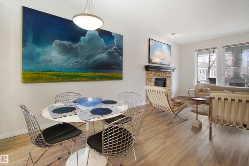 2028 74 Street, Edmonton, AB - Indoor Photo Showing Dining Room With Fireplace
