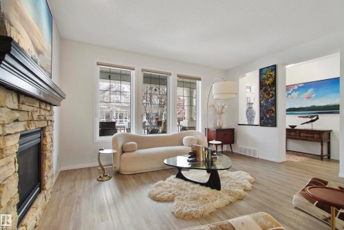 2028 74 Street, Edmonton, AB - Indoor Photo Showing Living Room With Fireplace