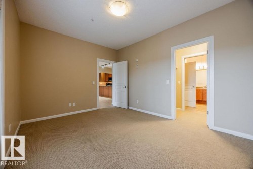 217 160 Magrath Road, Edmonton, AB - Indoor Photo Showing Other Room