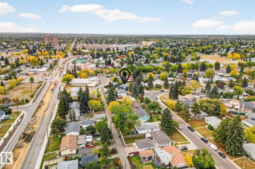Aerial view showcasing the residential neighbourhood with mature trees and a clear sky - 15701 92A Avenue, Edmonton, AB - Outdoor With View