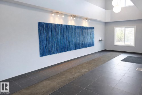 408 1230 Windermere Way, Edmonton, AB - Indoor Photo Showing Other Room