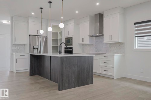 7446 Colonel Mewburn Road, Edmonton, AB - Indoor Photo Showing Kitchen With Upgraded Kitchen