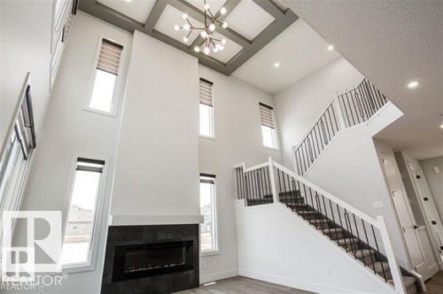 7446 Colonel Mewburn Road, Edmonton, AB - Indoor Photo Showing Other Room With Fireplace