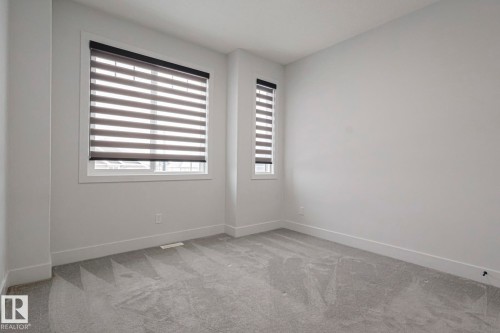7446 Colonel Mewburn Road, Edmonton, AB - Indoor Photo Showing Other Room