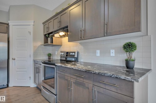 15807 18 Avenue, Edmonton, AB - Indoor Photo Showing Kitchen With Upgraded Kitchen