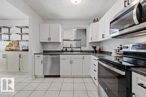 2340 138 Avenue, Edmonton, AB - Indoor Photo Showing Kitchen With Double Sink