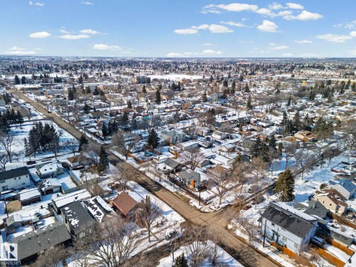 Aerial view showcasing a residential area with visible streets and numerous properties - 12913 124 Street, Edmonton, AB - Outdoor With View