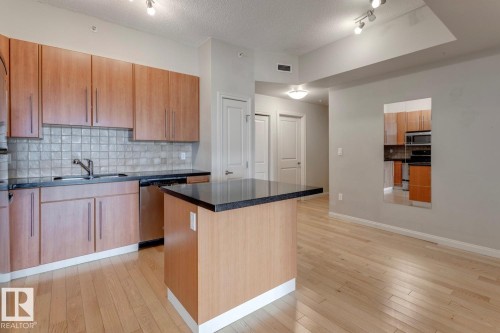 906 9819 104 Street, Edmonton, AB - Indoor Photo Showing Kitchen With Double Sink