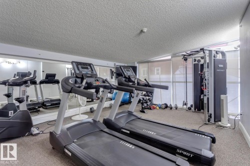 906 9819 104 Street, Edmonton, AB - Indoor Photo Showing Gym Room