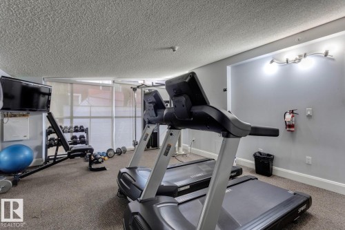 906 9819 104 Street, Edmonton, AB - Indoor Photo Showing Gym Room