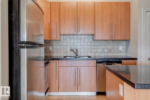 906 9819 104 Street, Edmonton, AB - Indoor Photo Showing Kitchen With Double Sink