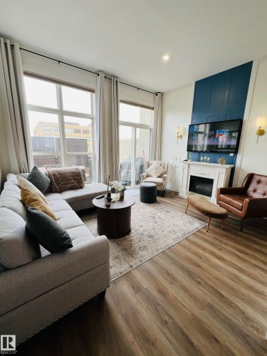 443 10403 122 Street, Edmonton, AB - Indoor Photo Showing Living Room With Fireplace