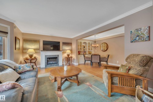 9727 101A Street, Edmonton, AB - Indoor Photo Showing Living Room With Fireplace