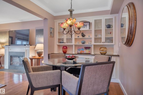 9727 101A Street, Edmonton, AB - Indoor Photo Showing Dining Room With Fireplace