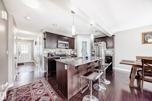 Microwave hood fan, plenty of counter space. - 1723 Hammond Crescent Nw, Edmonton, AB - Indoor Photo Showing Kitchen With Upgraded Kitchen