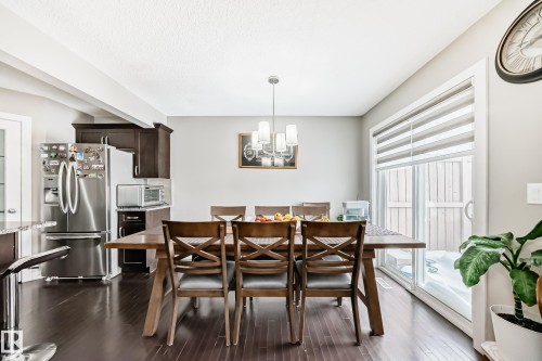 Dinning area that allows for family and guests. Bright large windows overlooking the yard. - 1723 Hammond Crescent Nw, Edmonton, AB - Indoor Photo Showing Dining Room