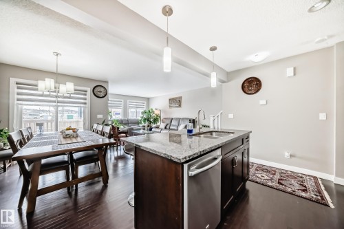 Room for a family, guest table and large widows to oversee the back area. - 1723 Hammond Crescent Nw, Edmonton, AB - Indoor