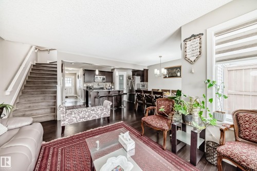 Stairs to the upper level. - 1723 Hammond Crescent Nw, Edmonton, AB - Indoor Photo Showing Living Room