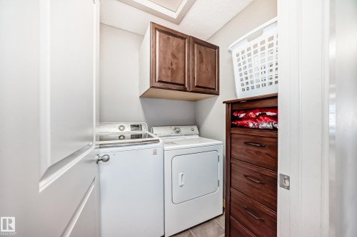Second floor laundry room. - 1723 Hammond Crescent Nw, Edmonton, AB - Indoor Photo Showing Laundry Room