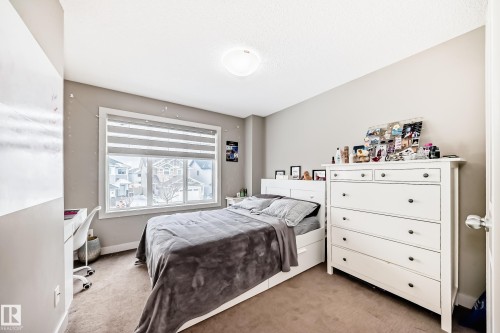 Upper level bedroom. - 1723 Hammond Crescent Nw, Edmonton, AB - Indoor Photo Showing Bedroom