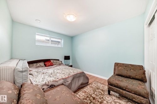 Lower level bedroom with a 3 piece and recreation room. - 1723 Hammond Crescent Nw, Edmonton, AB - Indoor Photo Showing Bedroom