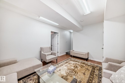 Lower level with a spacios bedroom, 3 piece bath and utility room. - 1723 Hammond Crescent Nw, Edmonton, AB - Indoor Photo Showing Other Room