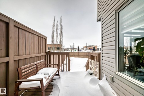Privacy wall on the deck and stairs leading to a grassed backyard for family fun and activities. - 1723 Hammond Crescent Nw, Edmonton, AB - Outdoor With Deck Patio Veranda With Exterior