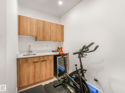 7741 81 Avenue Nw, Edmonton, AB - Indoor Photo Showing Gym Room