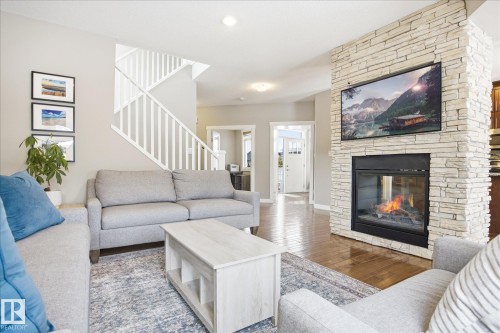 1408 Chahley Place, Edmonton, AB - Indoor Photo Showing Living Room With Fireplace