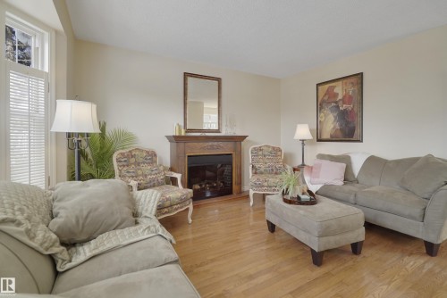 2005 108A Street, Edmonton, AB - Indoor Photo Showing Living Room With Fireplace