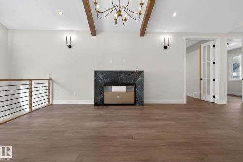 1129 Gyrfalcon Crescent, Edmonton, AB - Indoor With Fireplace