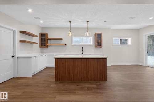 1129 Gyrfalcon Crescent, Edmonton, AB - Indoor Photo Showing Kitchen With Double Sink